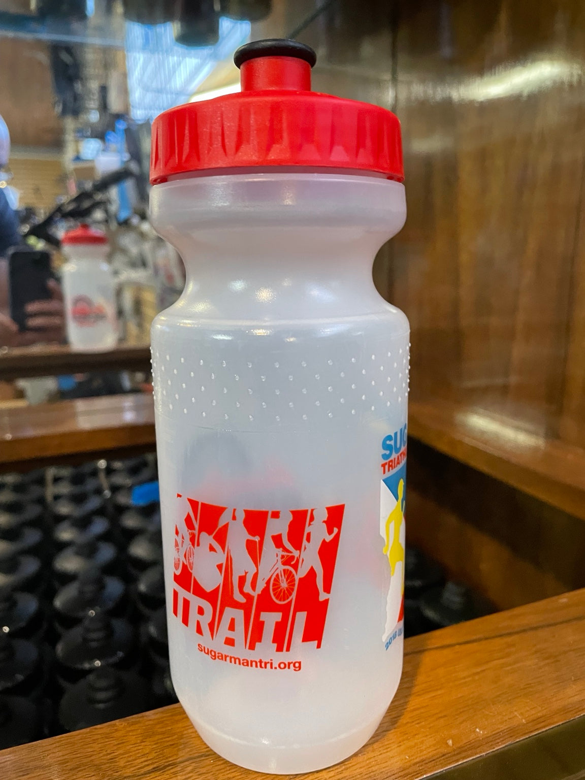 Sugarman TRAIL graphic on clear water bottle