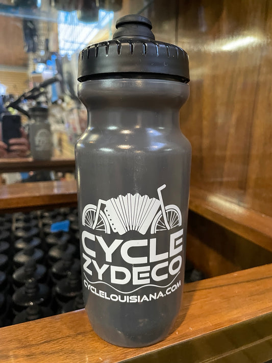 Cycle Zydeco logo on smoke colored water bottle