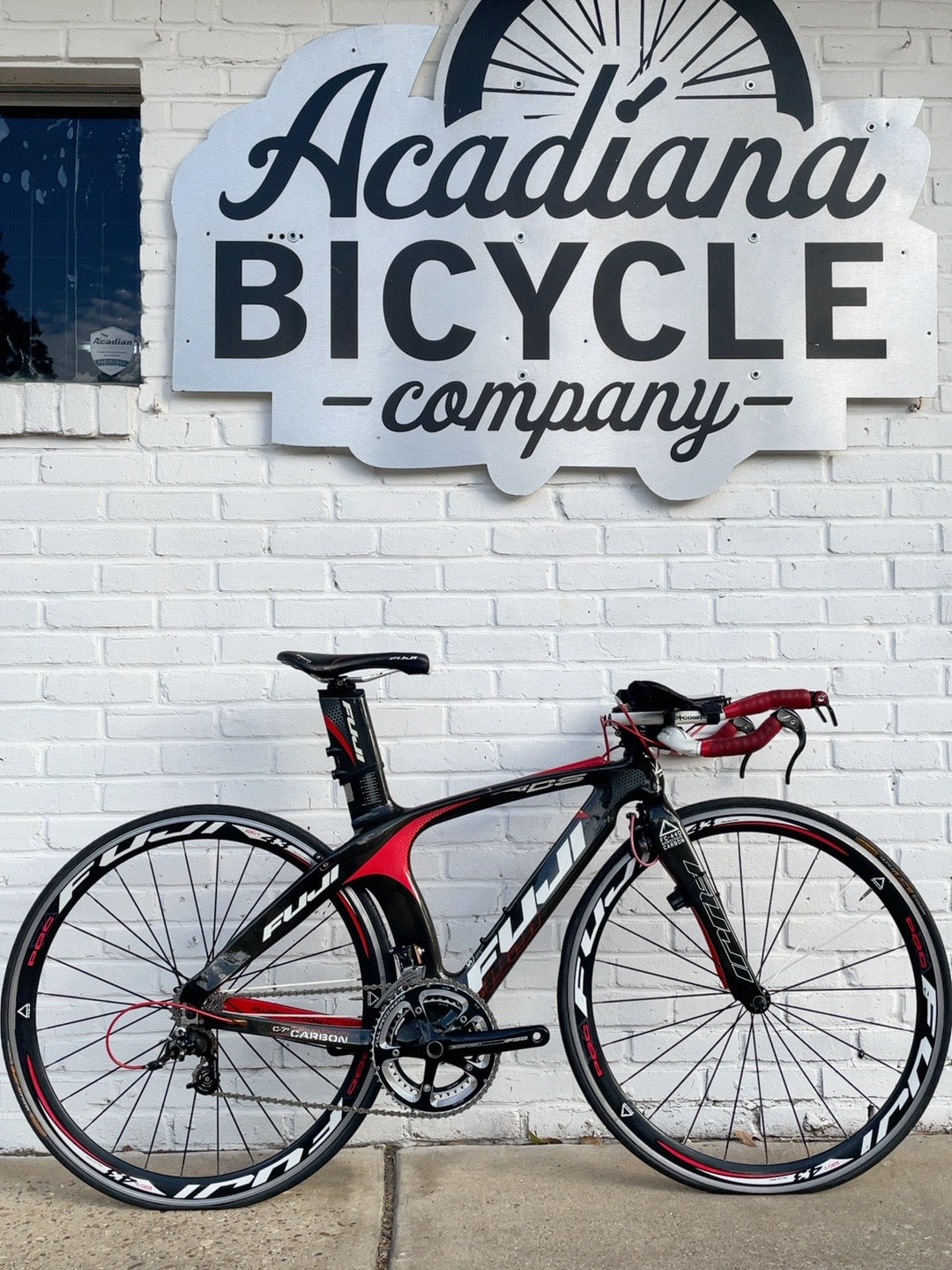 Fuji Aloha XXS black and red carbon triathlon bicycle
