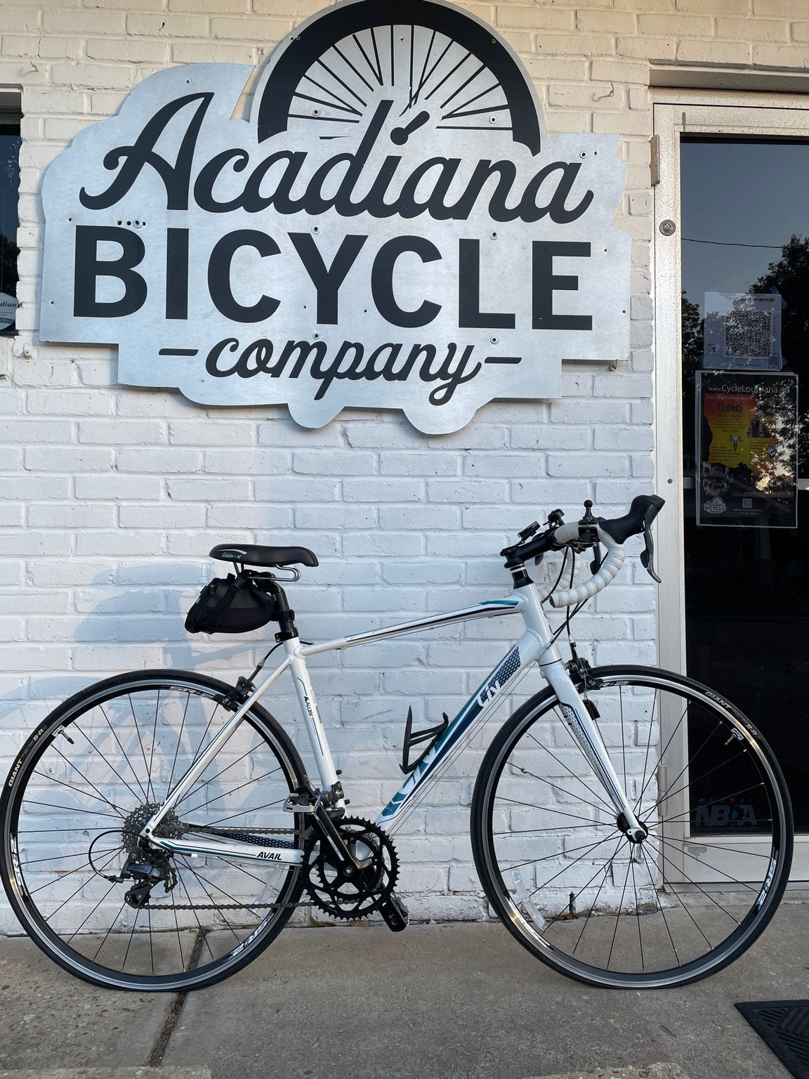 White and teal Liv Avail 4 used road bike